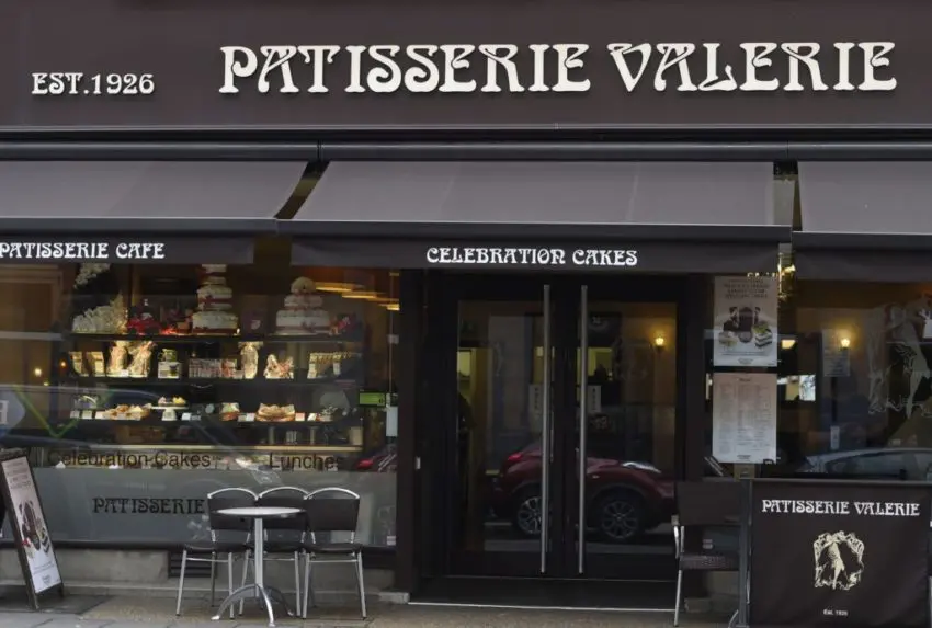 Patisserie Valerie chairman Luke Johnson has faced down sharp criticism from shareholders as the cafe chain gained backing for a rescue plan.