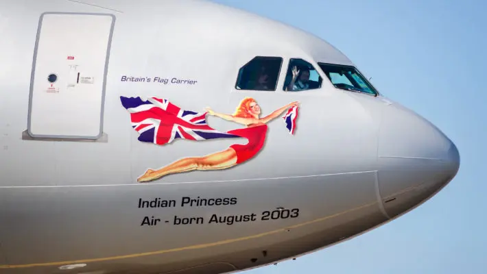 Pilot of the plain waving his hand