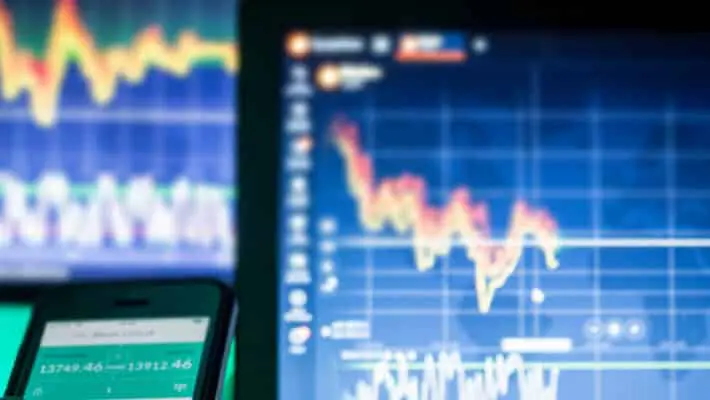 Crypto Currencies, trader using mobile phone and computers