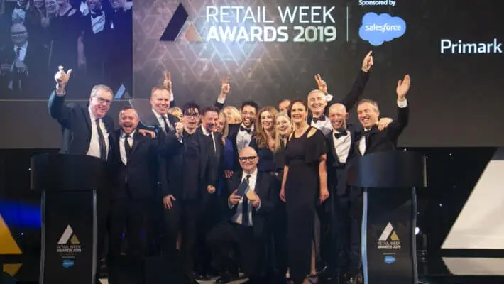 Primark team winning a Retail Week Award