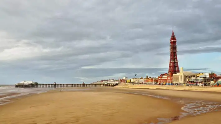 Blackpool Tower and pier, viewed across the sands.