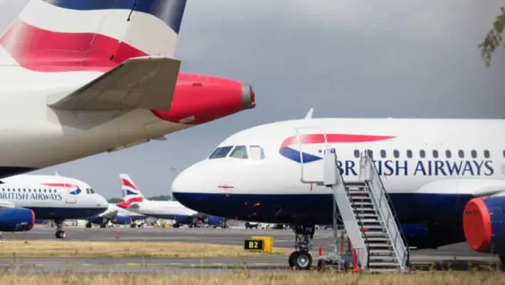 parked out of use British Airways aeroplanes stored at Bournemouth International Airport, Dorset during the Coronavirus crisis