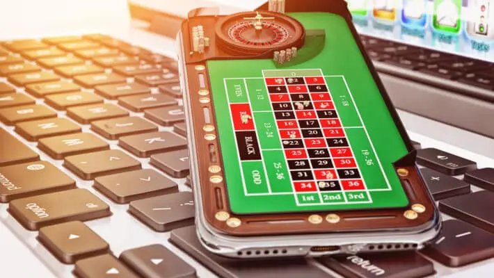 Online,Casino,And,Gambling,Concept,,Mobile,Phone,With,A,Roulette