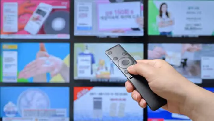 Someone,Who,Searches,Tv,Home,Shopping,Channels,With,A,Remote