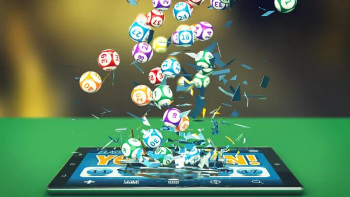 Tablet,Pc,With,A,Lottery,App,And,Lottery,Balls,Coming