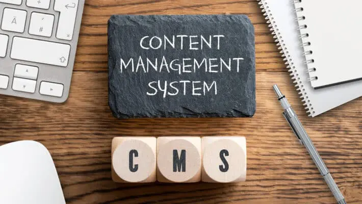 Acronym,Cms,On,Wooden,Cubes,And,Writing,Slate,With,Explanation