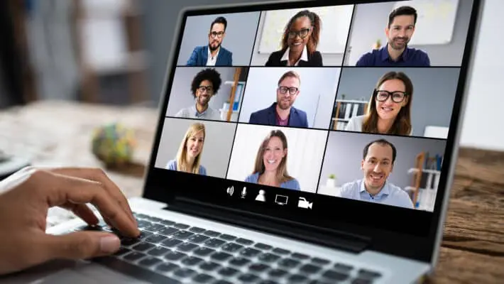 Man,Working,From,Home,Having,Online,Group,Videoconference,On,Laptop