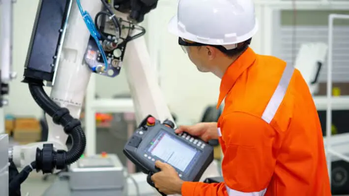 Smart,Factort,Concept:,An,Engineer,Use,Handheld,Controller,Setting,Industrial