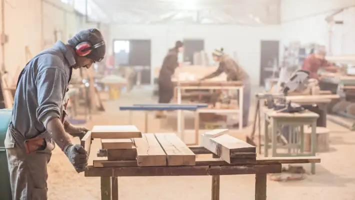 Man,Doing,Woodwork,In,Carpentry.,Carpenter,Work,On,Wood,Plank