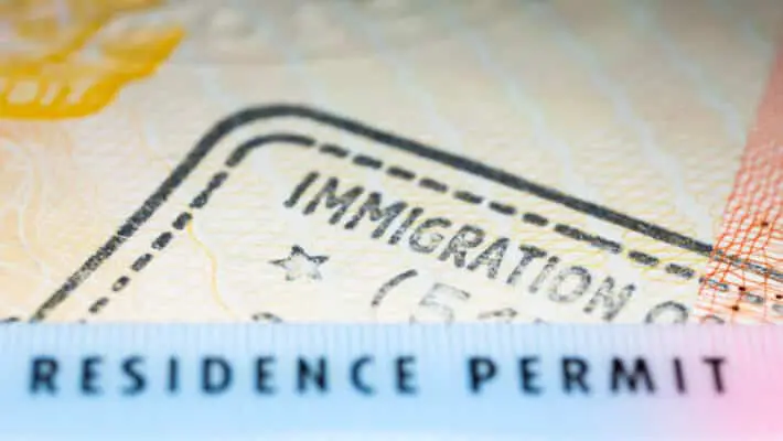 Immigration,Concept,Image.,Residence,Permit,Card,Over,Immigration,Stamp,On