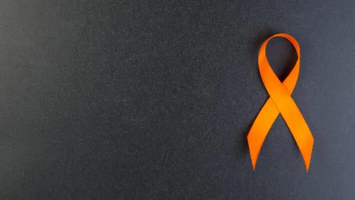 Orange,Ribbon,On,Black,Background.,Concept,Kidney,Cancer,(copd),And