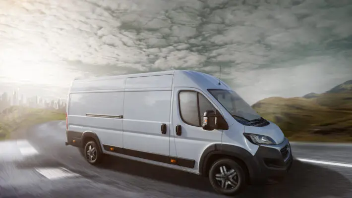 Delivery,Truck,Drives,On,A,Road