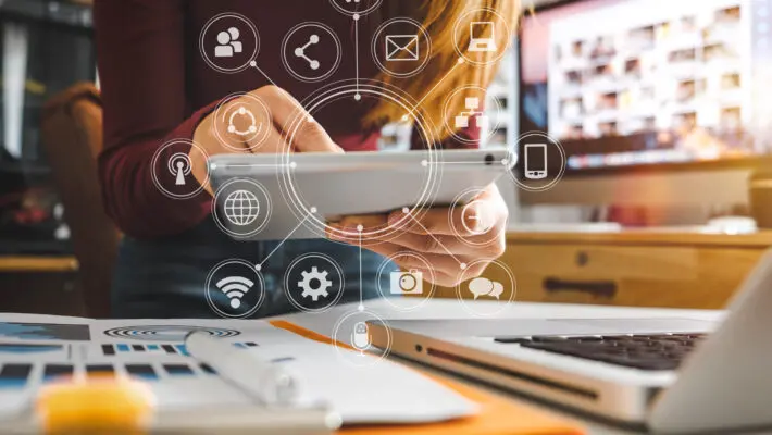 Businesswoman,Hand,Working,With,Laptop,Computer,,Tablet,And,Smart,Phone