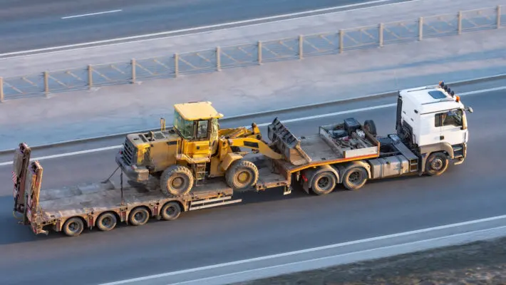 Truck,With,A,Long,Trailer,Platform,For,Transporting,Heavy,Machinery,