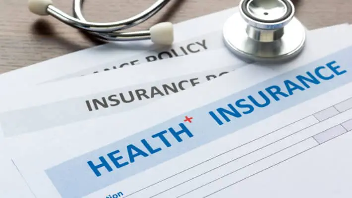 Health,Insurance,Form,With,Stethoscope,In,Top,View