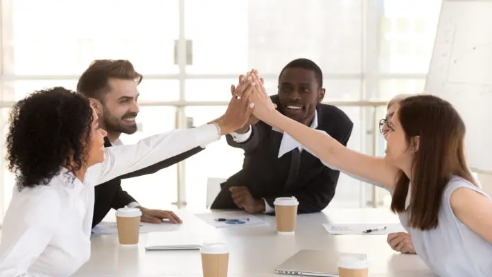Happy,Diverse,Colleague,Giving,High,Five,,Celebrating,Corporate,Success,,Business