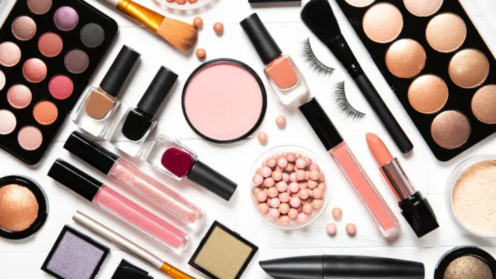 Decorative,Cosmetics,And,Makeup,Brushes,On,A,White,Background,,Top