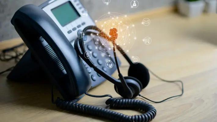 Voip,Services,Concept,Of,Ip,Telephone,Device,And,Headset,With
