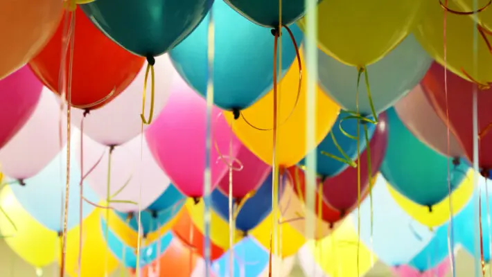 Helium,Balloons,With,Ribbons,In,The,Office.,Colorful,Festive,Background