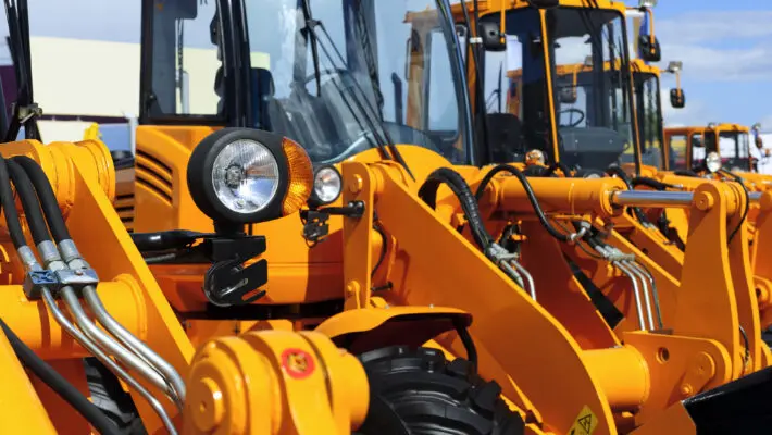 Bulldozer,Headlight,,Row,Of,Huge,Orange,Powerful,Construction,Machines,,Tractors,