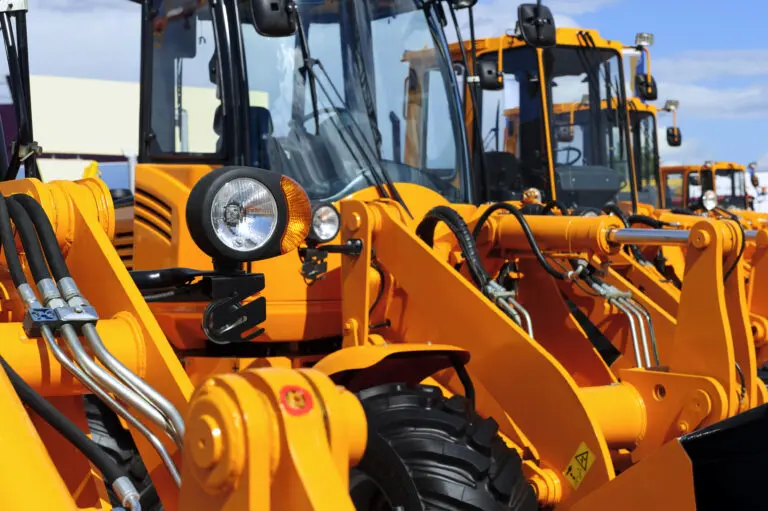 Bulldozer,Headlight,,Row,Of,Huge,Orange,Powerful,Construction,Machines,,Tractors,