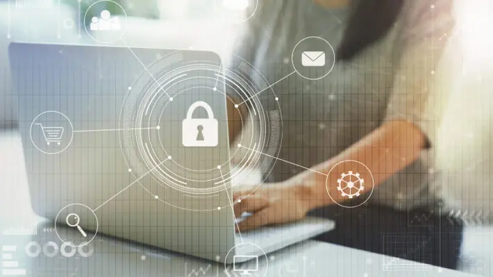 Cyber,Security,With,Woman,Using,Her,Laptop,In,A,Living