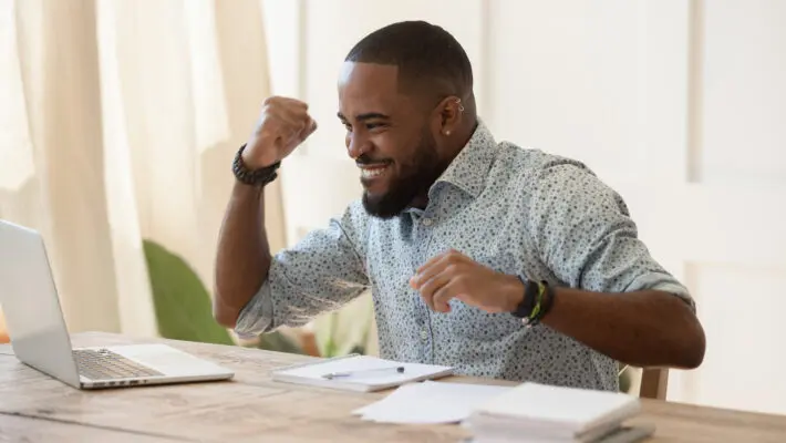 Euphoric,Young,Black,Man,Celebrating,Online,Lottery,Win,,Excellent,Educational