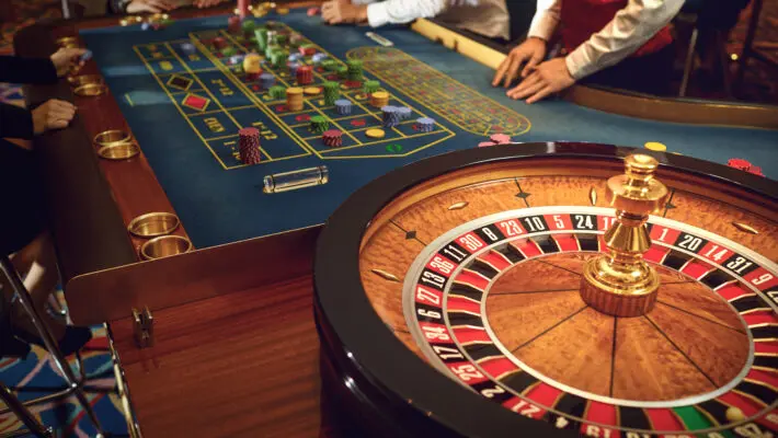People,Gambling,At,Roulette,Poker,In,A,Casino.