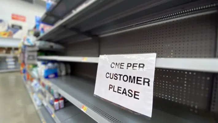 A,View,Of,Empty,Shelves,At,A,Department,Store,During