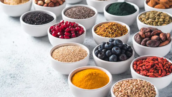 Various,Superfoods,In,Smal,Bowl,Gray,Concrete,Background.,Superfood,As