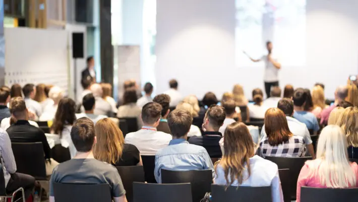 Speaker,Giving,A,Talk,In,Conference,Hall,At,Business,Event.