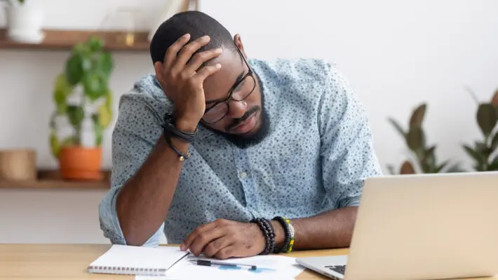 Tired,Depressed,Bored,African,Businessman,Frustrated,By,Business,Failure,Bankruptcy