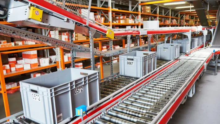 Warehouse,Management,System.,Conveyer,With,Automaticaly,Moving,Boxes