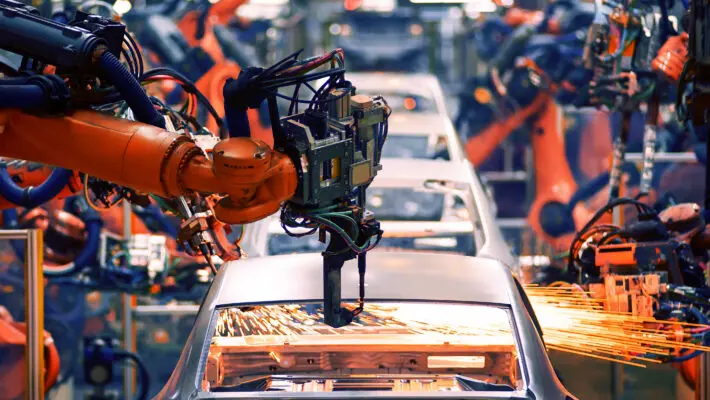 The UK economy grew at a slower pace than first estimated between July and September, revised figures show.