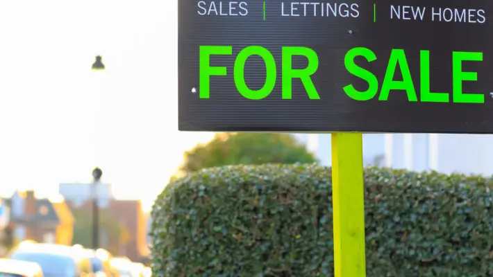 Britain’s housing market is to slow dramatically in 2022 as borrowing costs rise and household budgets come under mounting strain, property experts have predicted.