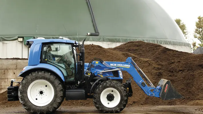 British Christmas dinner tables this year could feature vegetables harvested by a world-first low carbon, cow dung-powered tractor, thanks to Government backing.