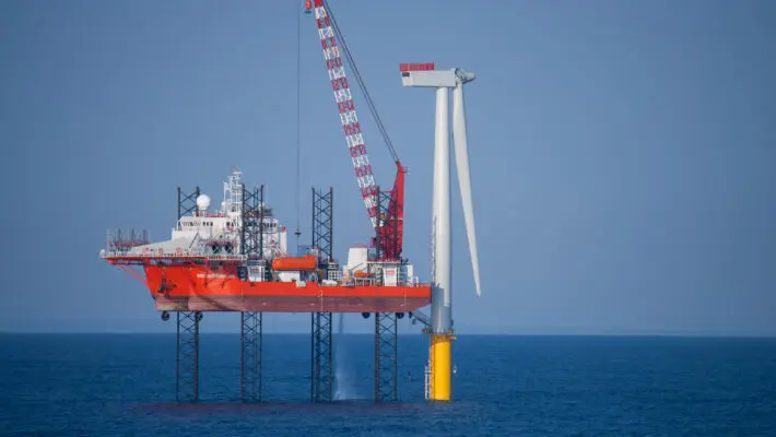 The Scottish government is in line for a windfall of almost £700m after the largest ever auction of the country’s seabed plots attracted bids from big oil and renewable energy companies hoping to build next generation windfarms.