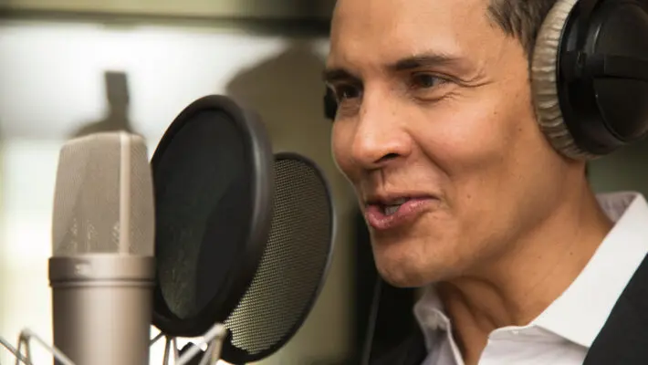 Actor,And,Radio,Announcer,With,Headphones,And,Microphone,Working,Film