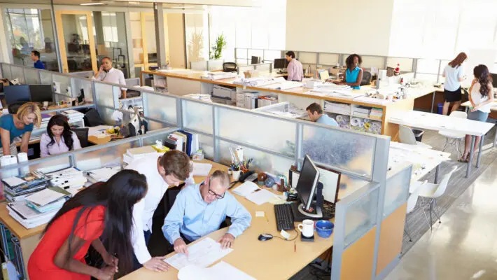 Returning to work in offices will help younger staff with their careers, the boss of a pub firm has said.