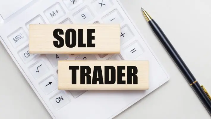 Wooden,Blocks,With,The,Sole,Trader,Iie,On,A,Light