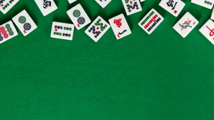 White-green,Tiles,For,Mahjong,On,On,Green,Cloth,Background.,Emty
