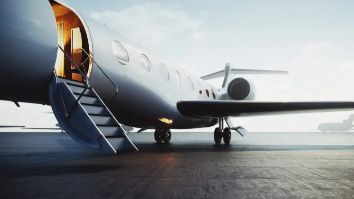 Closeup,View,Of,Private,Jet,Airplane,Parked,At,Outside,And