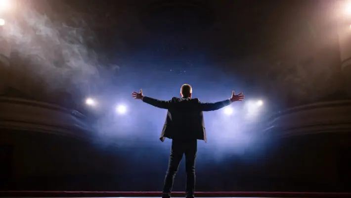 Showman.,Middle,Age,Male,Entertainer,,Presenter,Or,Actor,On,Stage.