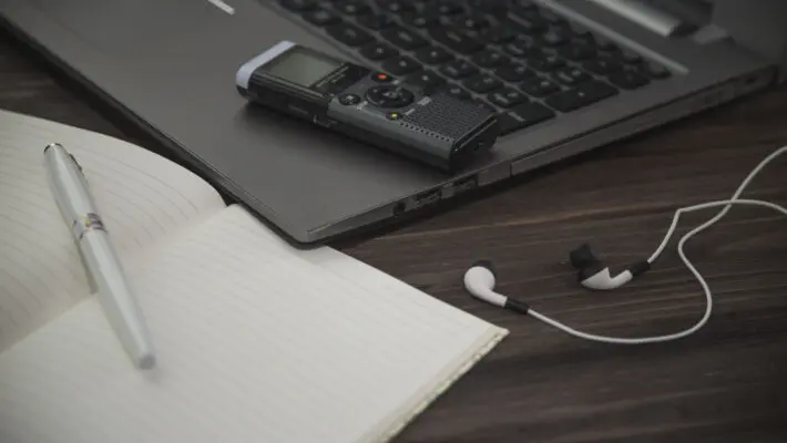 Journalist’s,Work,At,A,Computer,With,A,Voice,Recorder