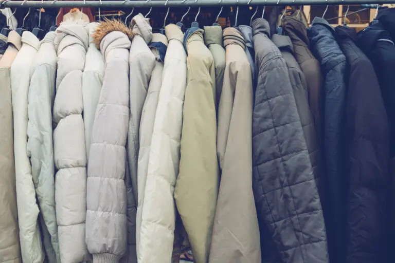 Fashion,Winter,Coats,Hanged,On,A,Clothes,Rack.