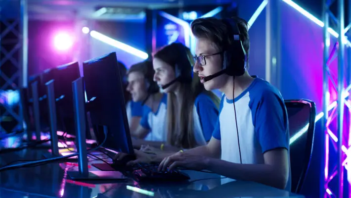 Team,Of,Teenage,Gamers,Play,In,Multiplayer,Pc,Video,Game