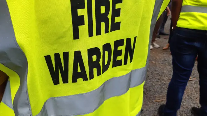 Yellow,Jacket,Showing,Fire,Warden,On,Duty.,Safety,Background.
