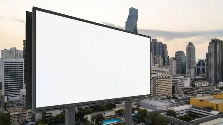 Blank,White,Road,Billboard,With,Bangkok,Cityscape,Background,At,Sunset.
