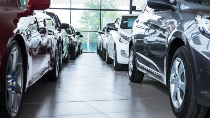 Modern,Beautiful,Showroom,With,Cars,Being,Sold