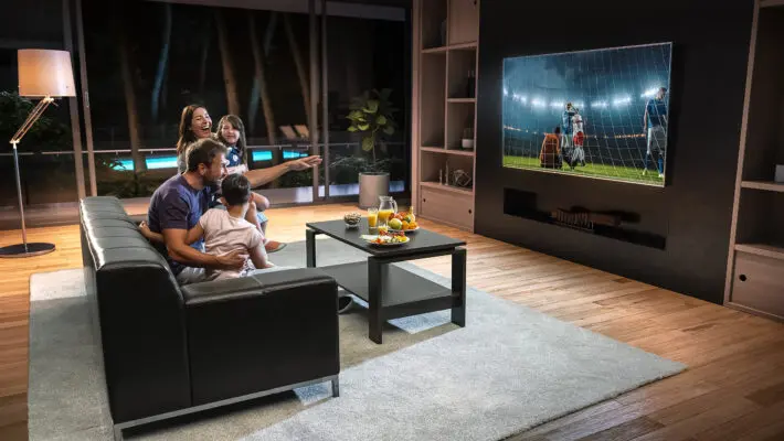 A,Family,Is,Watching,A,Soccer,Moment,On,The,Tv